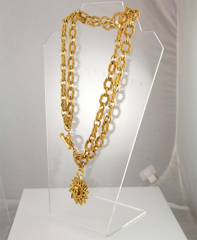 Gold Tone Sun Burst Pendant and Chain by Chanel 5