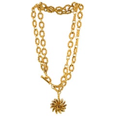 Gold Tone Sun Burst Pendant and Chain by Chanel