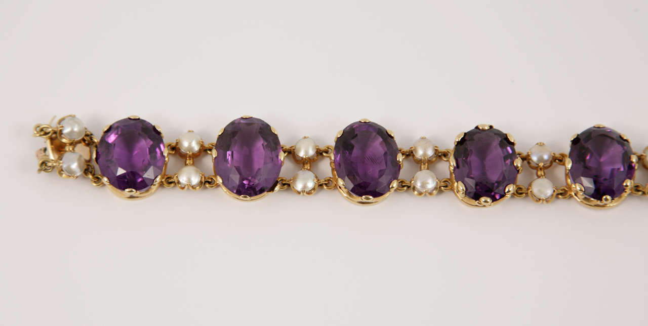 A gorgeous antique 18 carat yellow gold, amethyst and pearl bracelet with French hallmark circa 1880

All seven amethysts are beautifully matched and the workmanship is exquisite. 
A true example of French craftsmanship of the period