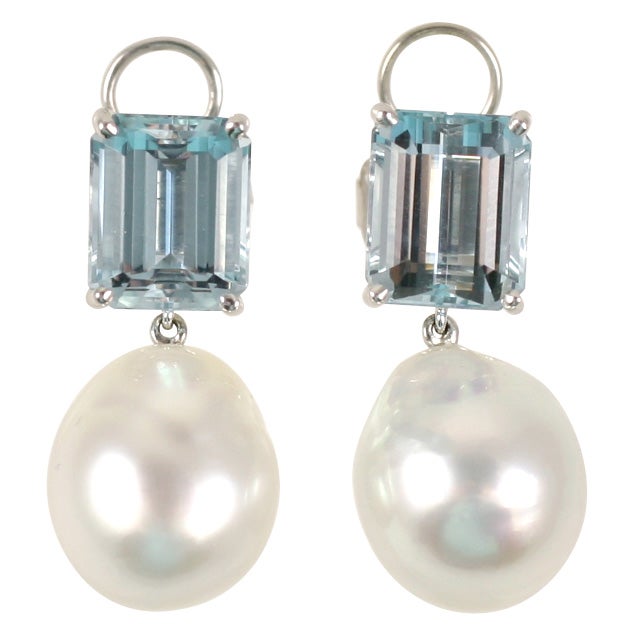 Crystal clean aquamarine above stunning baroque pearls of superior luster. A truly fabulous every day earring. Easily made into clip on earrings.