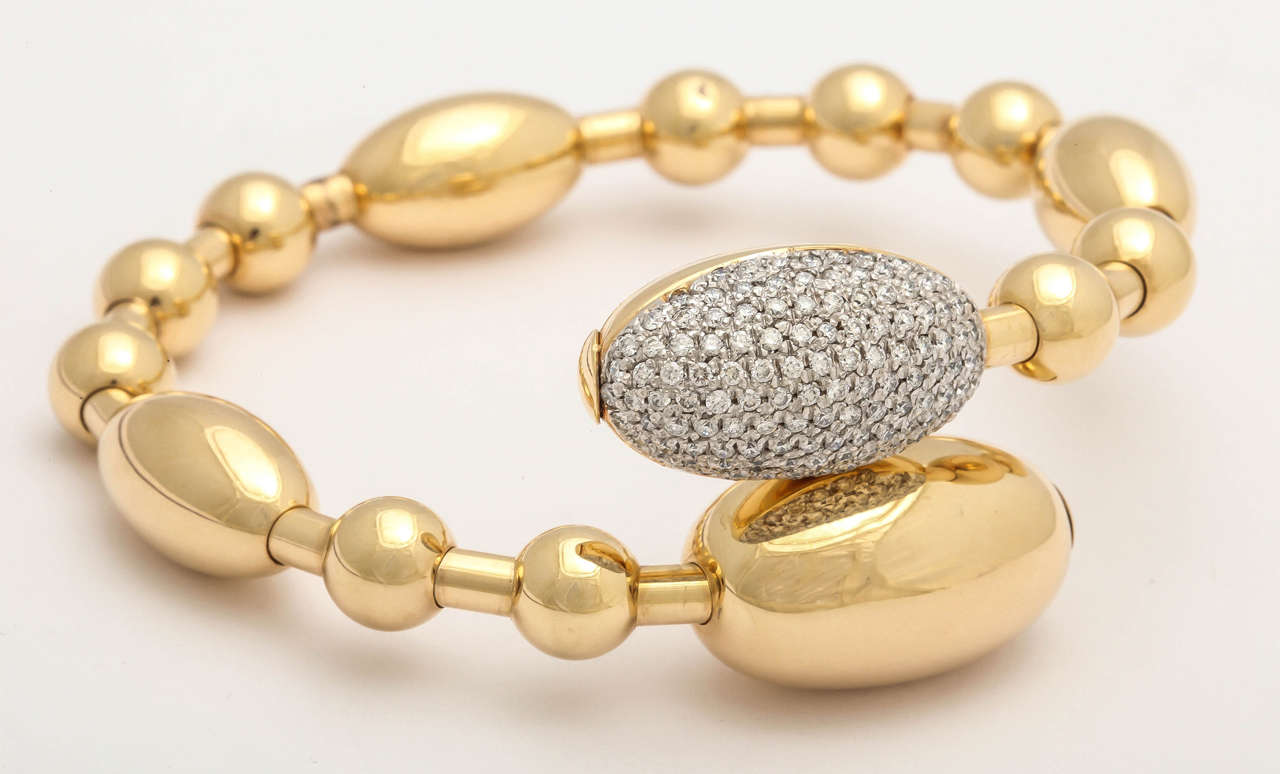 18K Italian yellow gold and white diamonds oval bead Tuca Tuca bracelet
from Faraone Mennella's 