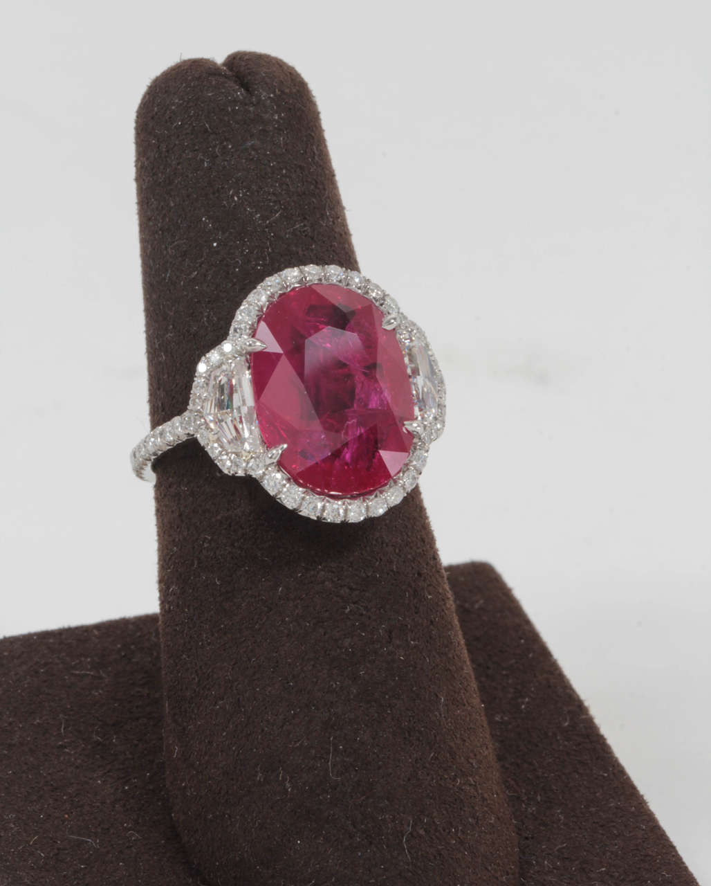 Oval Cut Incredible Eight Carat Certified Ruby and Diamond Set in Platinum For Sale