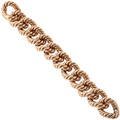 An Italian red gold torsade bracelet