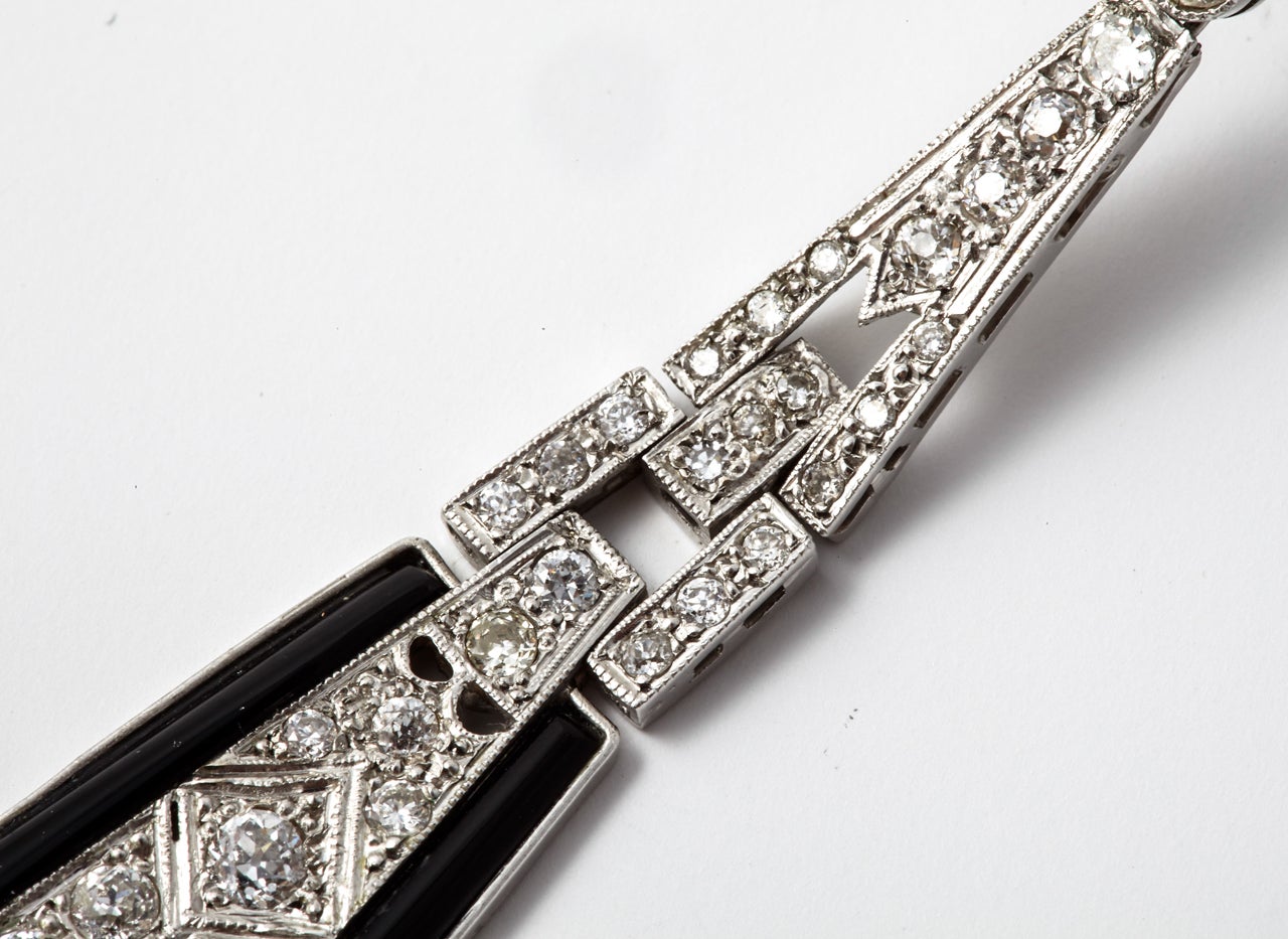 Art Deco A Pair of Art Déco onyx and diamond Pendant Earrings For Sale