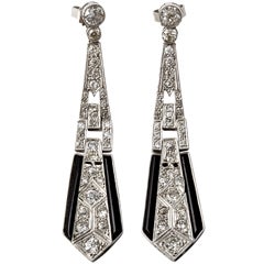 A Pair of Art Déco onyx and diamond Pendant Earrings