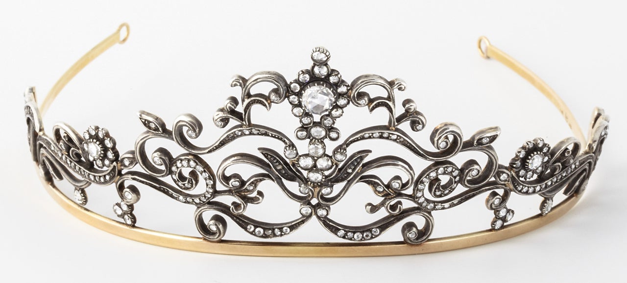 A fine silver and yellow golden tiara set with round rose cut diamonds on silver. Made in the belle époque style.

All of our prices exclude VAT.