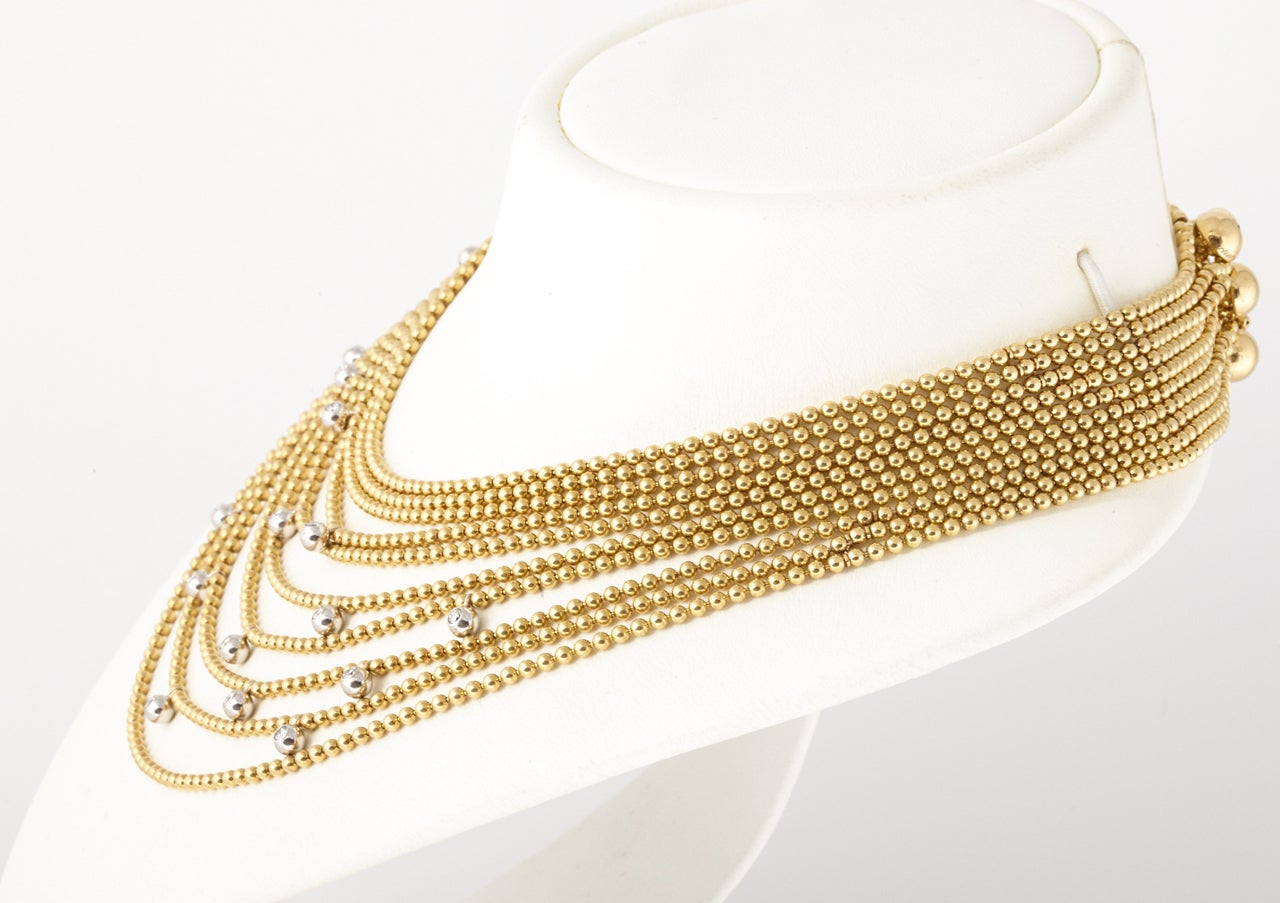 Women's A gold and diamond draperie ball necklace by Cartier