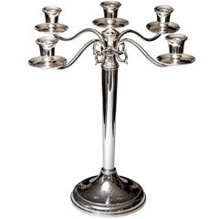 A handmade silver five arms candelabra
