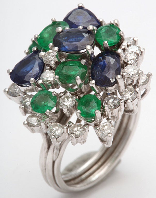 Handmade Platinum Mounting prong set with 4 Oval Sapphires, 6 various shaped Emeralds &  25 full cut & very white Diamonds. Size 5 1/2+. Engraved Plat. Possibly Oscar Heymann.