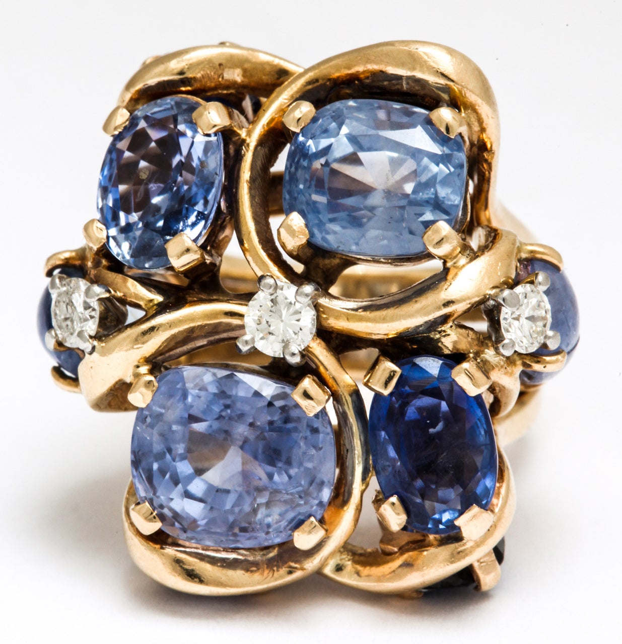 10 oval sapphires 21.00 carats
3 diamonds 0.50 carats
amazing design original Seaman Schepps 1940's
all major stones have been re polished and weighed