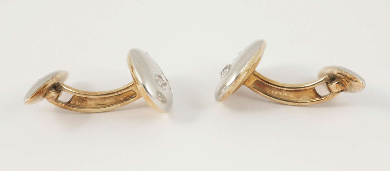 Pair of white and yellow gold,diamond set cufflinks by Meister of Zurich. In original case, circa 1910.