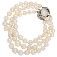 Art Deco Triple Strand Pearl And Diamond Bracelet