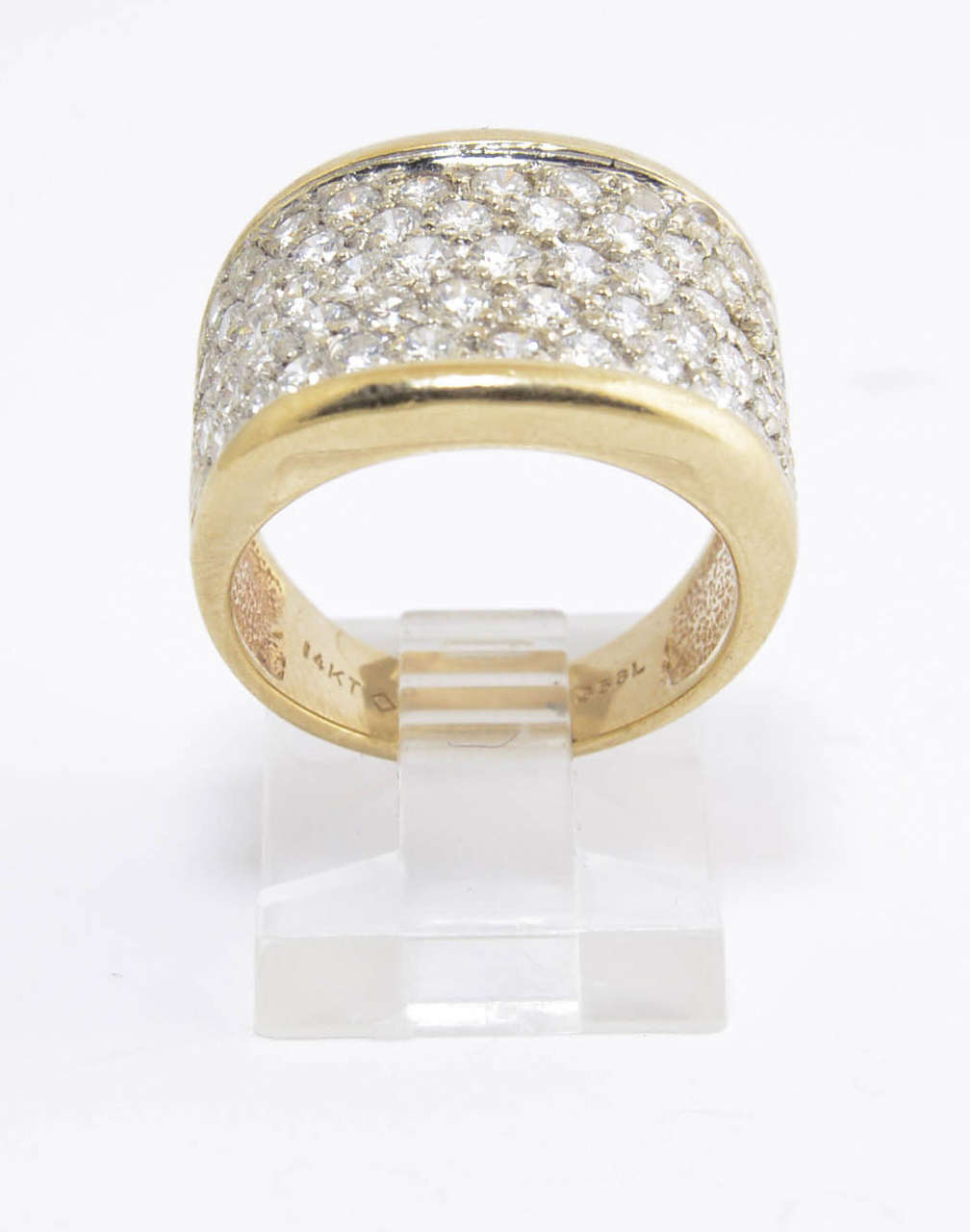 This 14k yellow gold ring has almost 3 carats in diamond.  (2.90c atw. of the diamonds) 
Size - US between 6.5 and 6.75