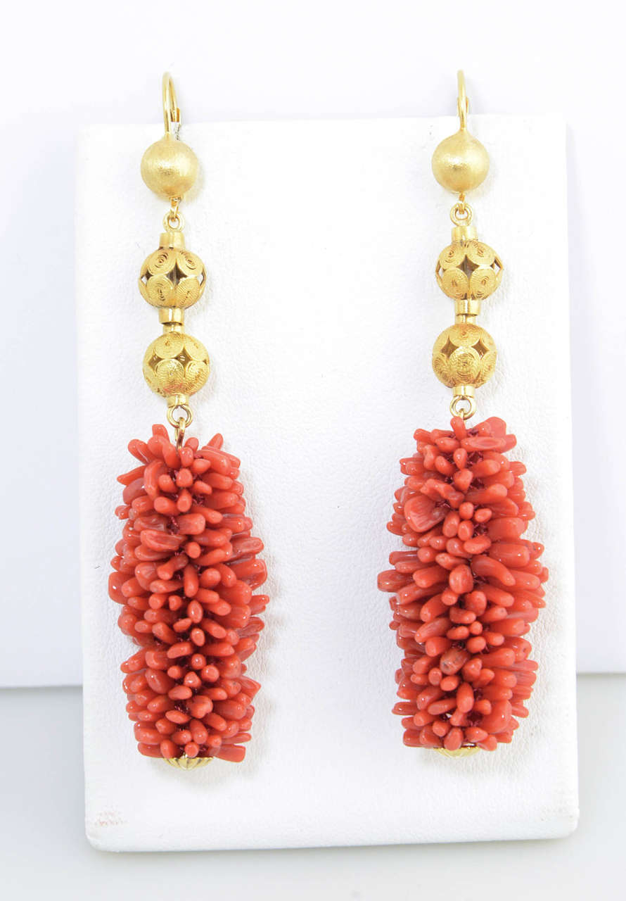 Etruscan 18k ball drops with cluster rod of coral.