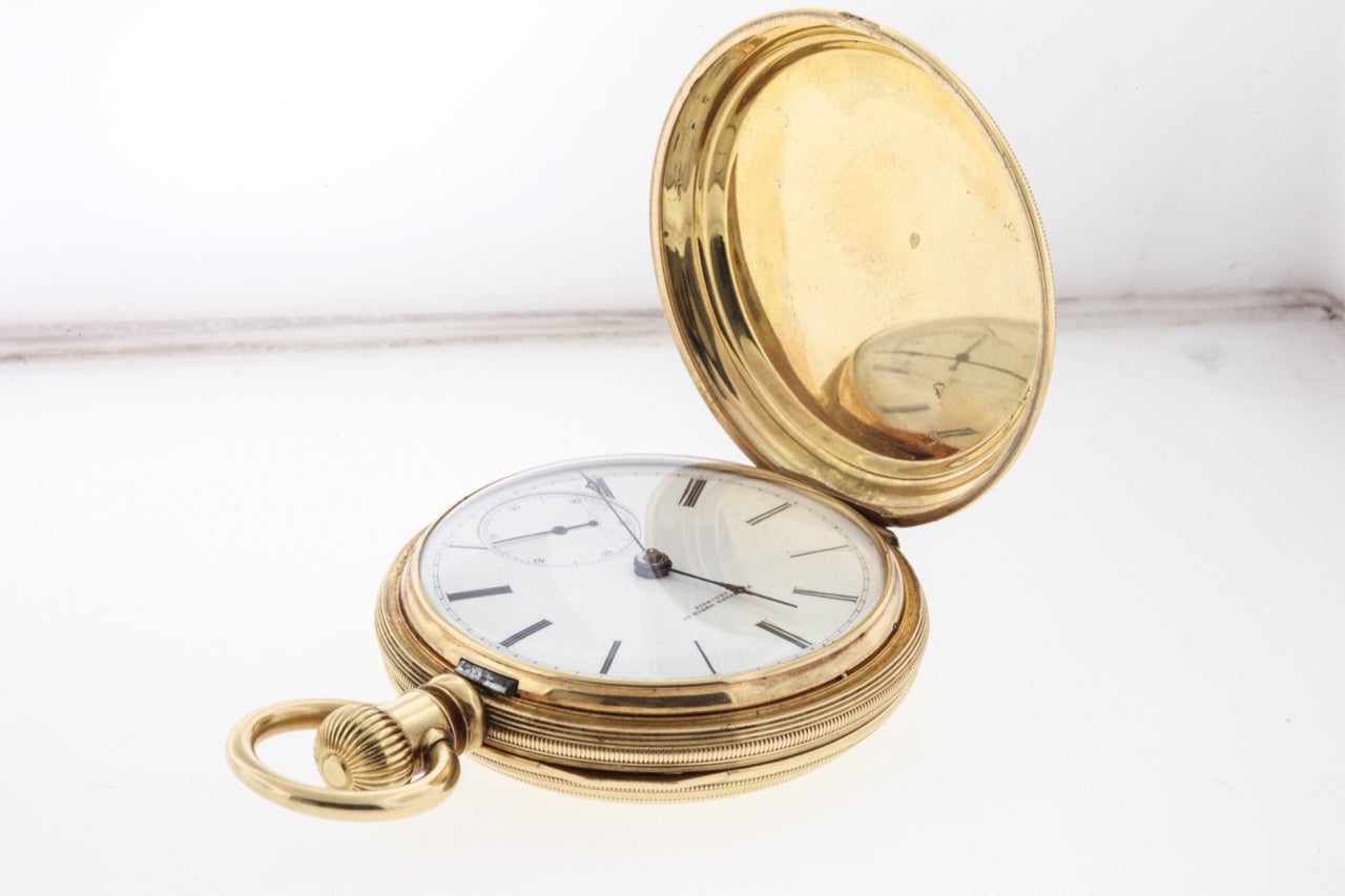 Substantial Waltham 18k yellow gold hunting case pocket watch, 53mm, features a three part case, the front and back engine-turned covers with a horizontal decorative engraved band, one side with a blank shield for a monogram, the other with a
