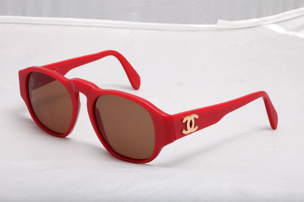 Very rare Chanel red sunglasses with gold CC.
