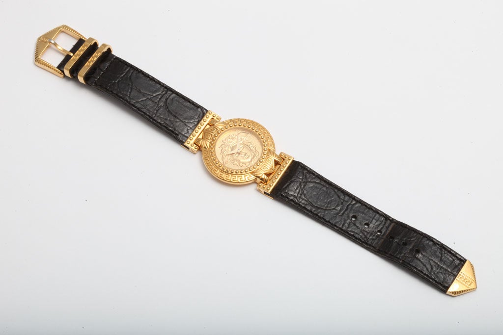 Very rare Gianni Versace Medusa watch with crocodile embossed belt.
Unisex.
Face 1.3 inches in diameter. Fits 7-8 inches wrist. Belt width 0.8 inch.
