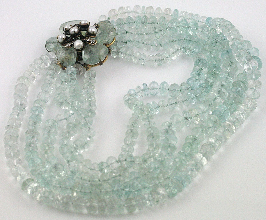 A stunning five strand necklace of faceted aquamarine beads by Iradj Moini with a gorgeous 2.25