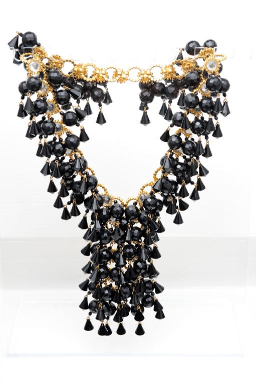 WONDERFUL DRAMATIC GOLD GILT,FAUX DIAMOND AND BLACK LUCITE NECKLACE SIGNED DE LILLO IN AN OVAL HANG TAG BY THE CLASP ,SIMILAR PIECES IN ' JEWELS OF FANTASY 