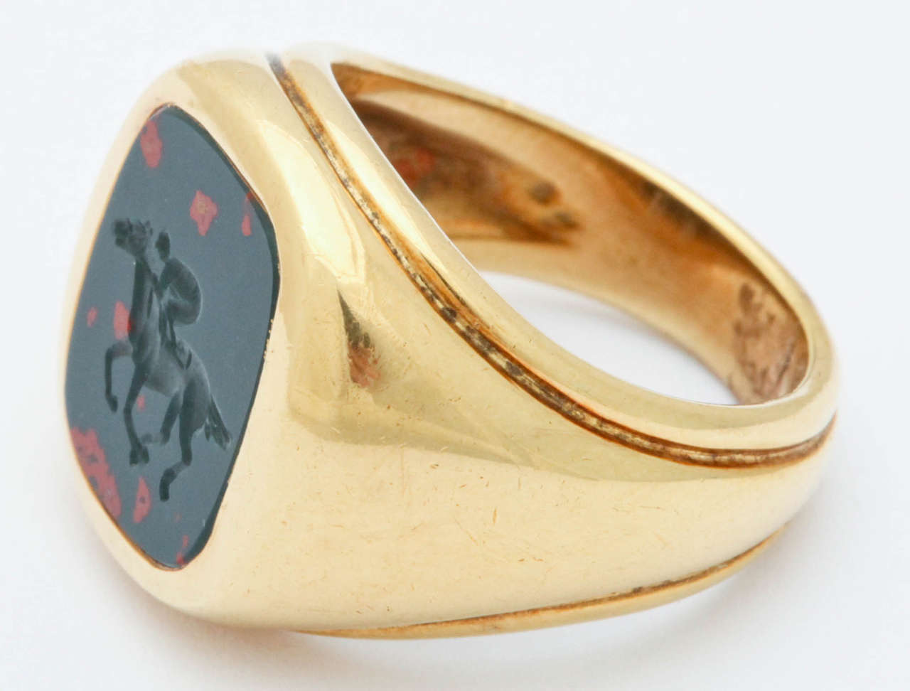 Contemporary Bloodstone Yellow Gold Jockey Intaglio Ring For Sale
