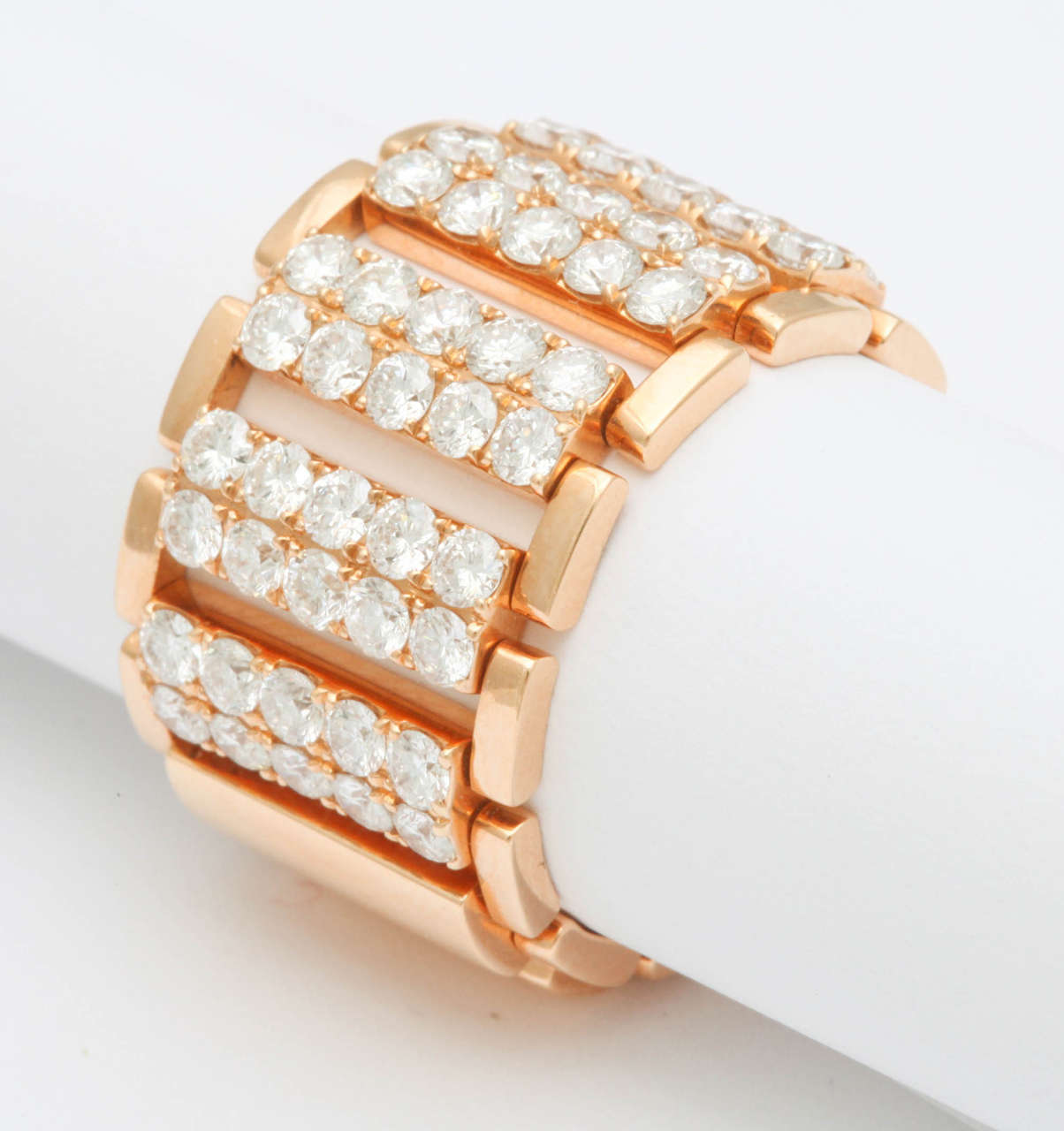 Italian 14k  rose gold flexible ring featuring 50 round cut brilliant diamonds, weighing 2.22 carats. Very well made!

Can be ordered in any size and color.
