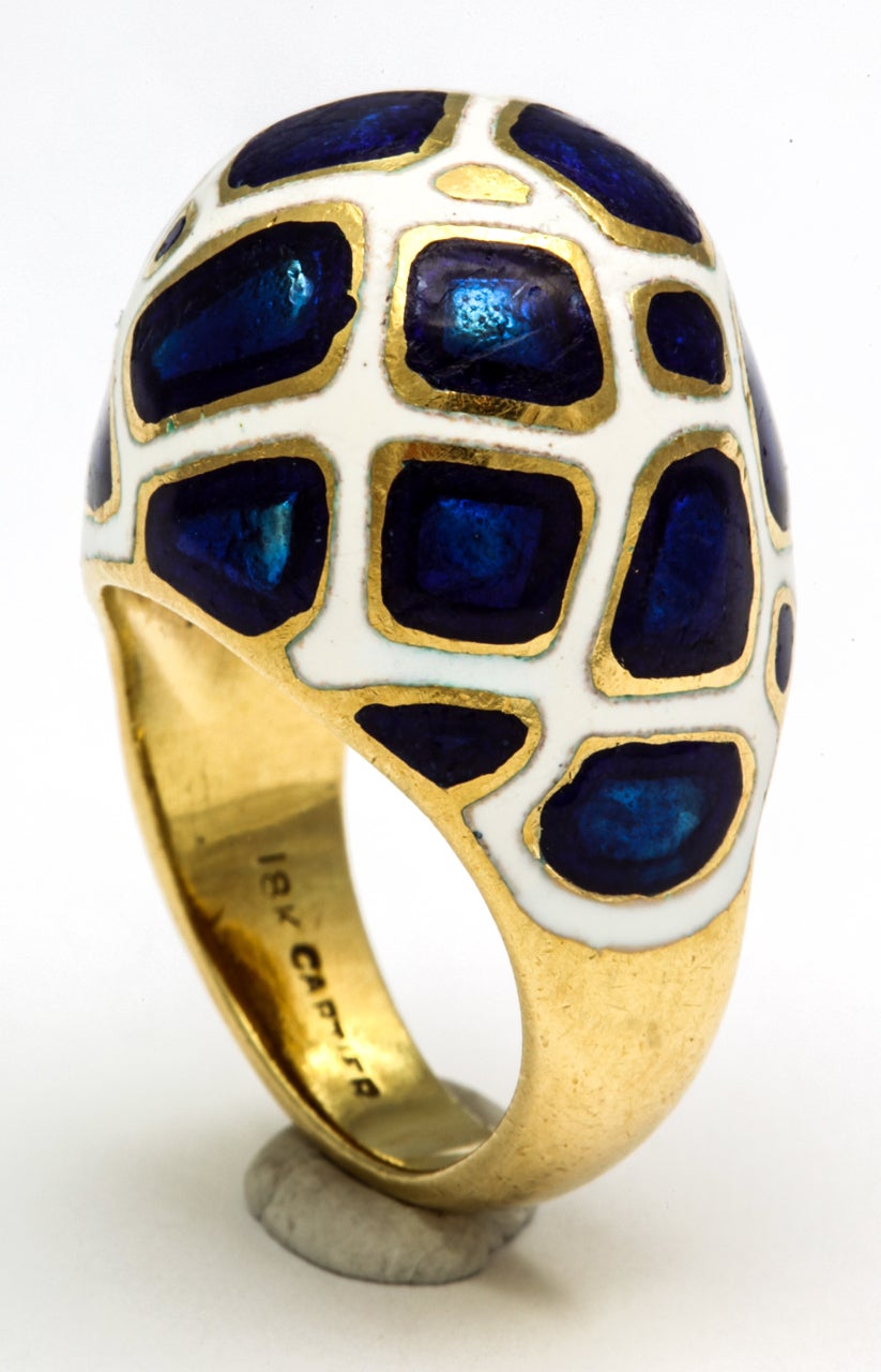 18kt yellow gold and enamel animal print design ring consisting of two color enamel blue and white made by Cartier fully signed and numbered