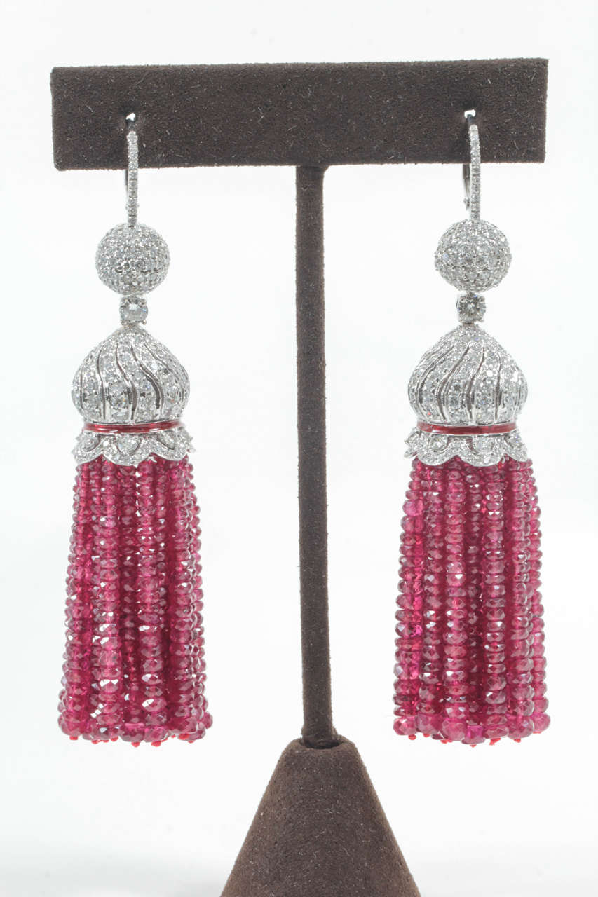 A beautiful piece of jewelry

200 carats of fine Burma Ruby Beads

7.95 carats of round brilliant cut diamonds

All set in 18k white gold. Over 3 inches in length.