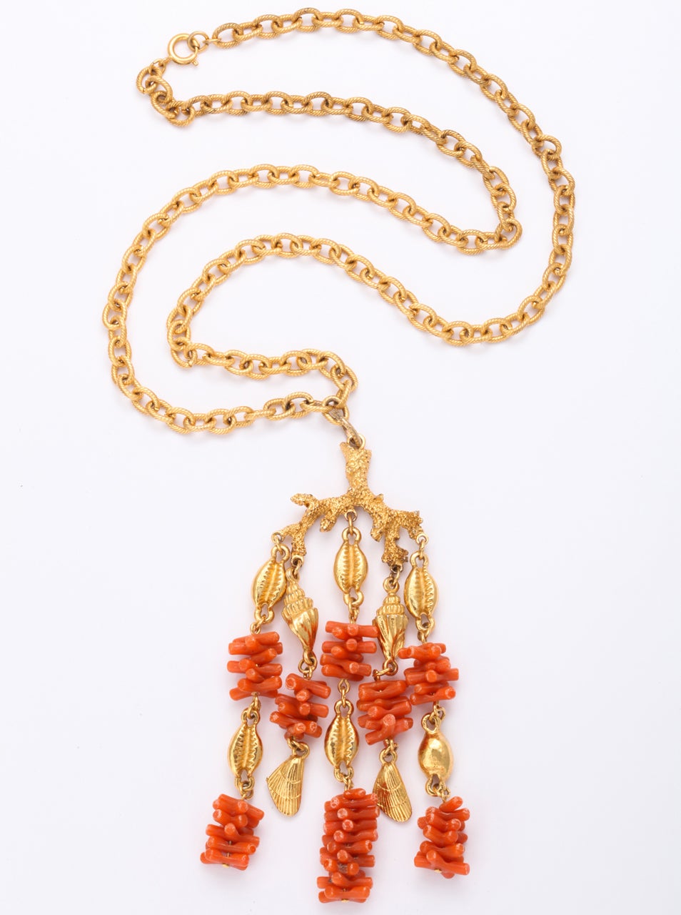 Faux coral  and shell pendant necklace. 28