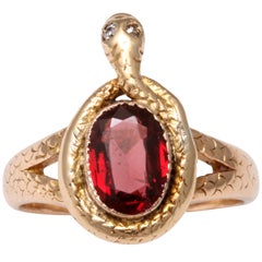 A Serpent Ring with Love Stone