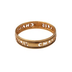 Vintage CHANEL LOGO CUTOUT BANGLE