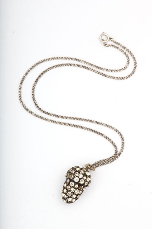 Sterling silver and uniformly sparkling paste make this acorn necklace extemely attractive. Any darker pastes are due to placement and light.<br />
For a symbol so historically strong and one that conveys many meanings, it is unusal that we have