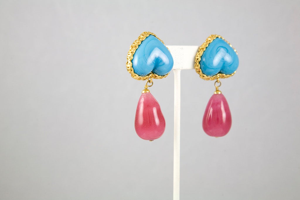 A Mint condition pair of Fall collection Chanel Gripoix poured glass earrings.  The color is more intense than the photographs show.  The reverse heart is framed with entwined C's that are 3/16