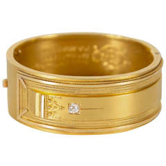 Exquisite Victorian Gold Bangle Bracelet with Engraved and Relief Design