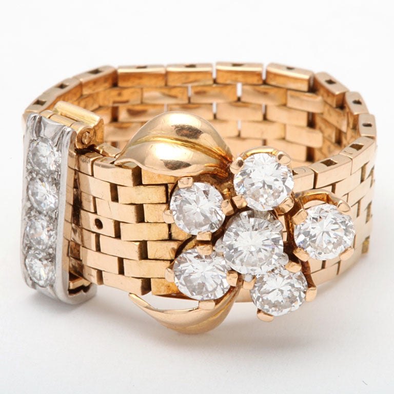 18kt yellow gold adjustable belt buckle ring with four holes to make any size you want embellished by diamonds
