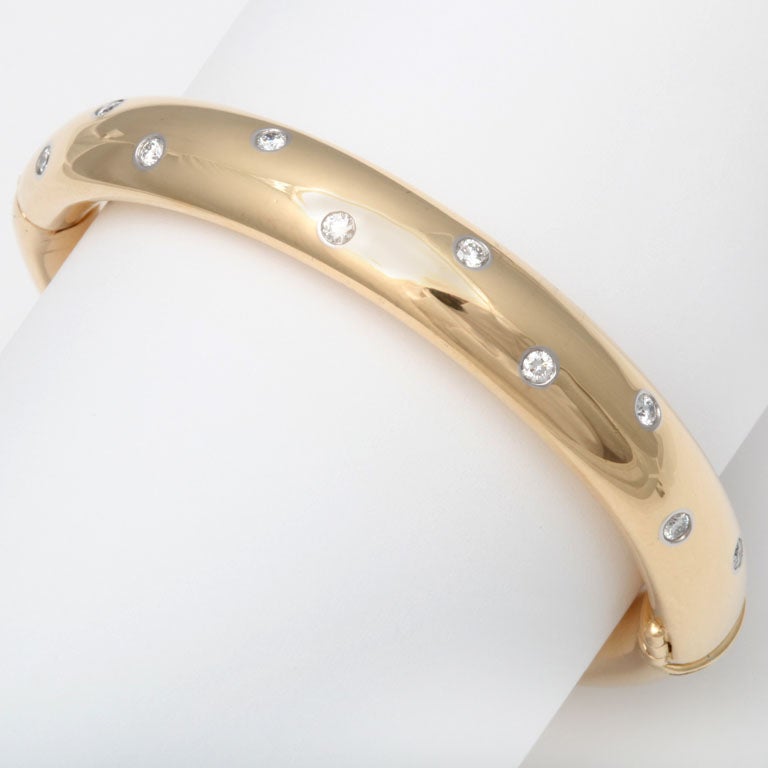 TIFFANY and Co. Gold And Diamond Bangle Bracelet