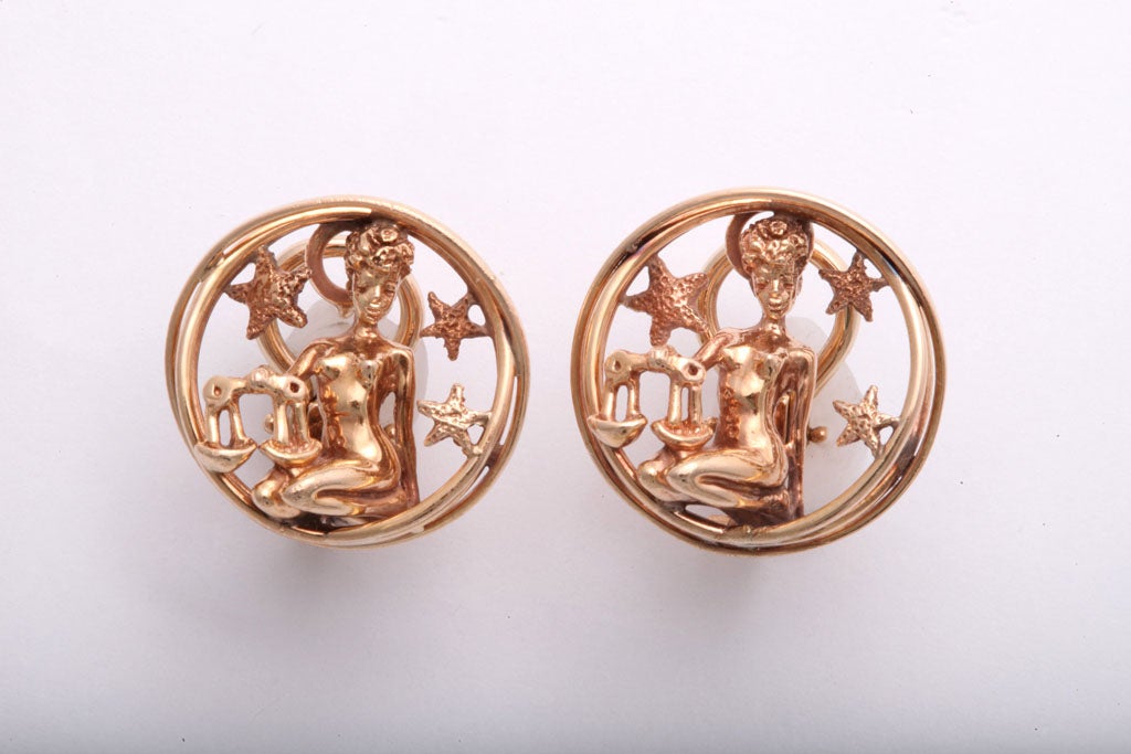 Ruser was a famous jeweler on Rodeo Drive.  These earrings are part of his astrological collection.  Marked 14k & Ruser