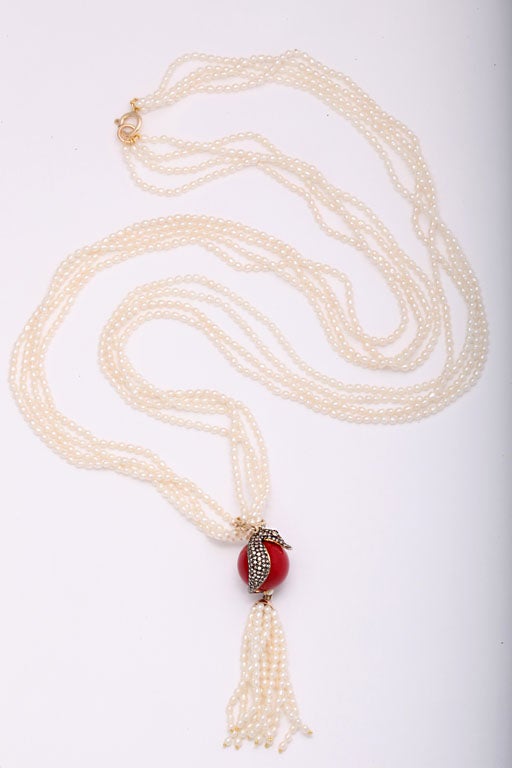 We found this great silver on gold diamond seahorse and coral drop.  We were inspired to design the necklace to showcase the drop. <br />
 <br />
This delightful piece can be worn many ways.  You can remove the Seahorse Coral & Pearl tassel to