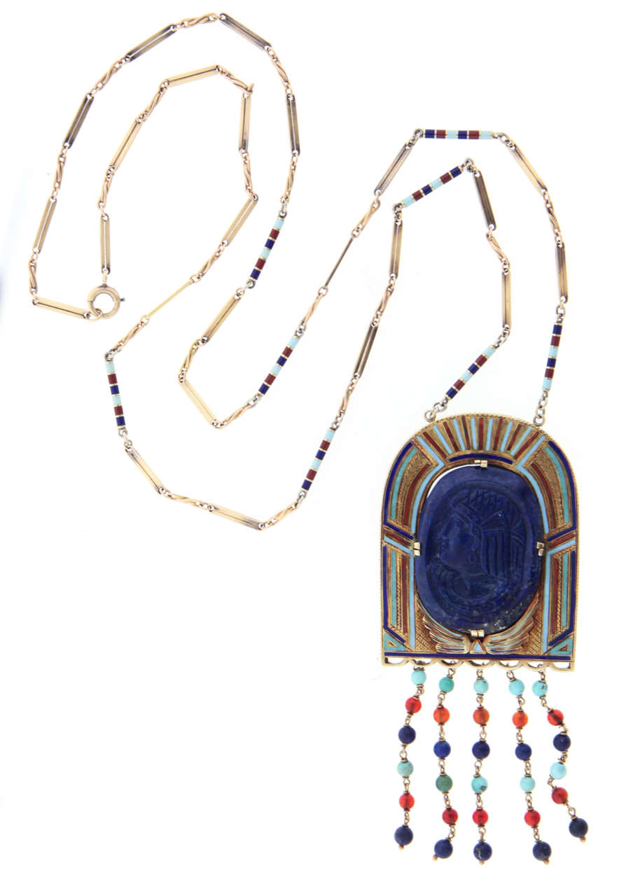 Egyptian Revival necklace, circa 1925,  is a beautiful composition in 14K gold, lapis and enamel, the 1-1/2