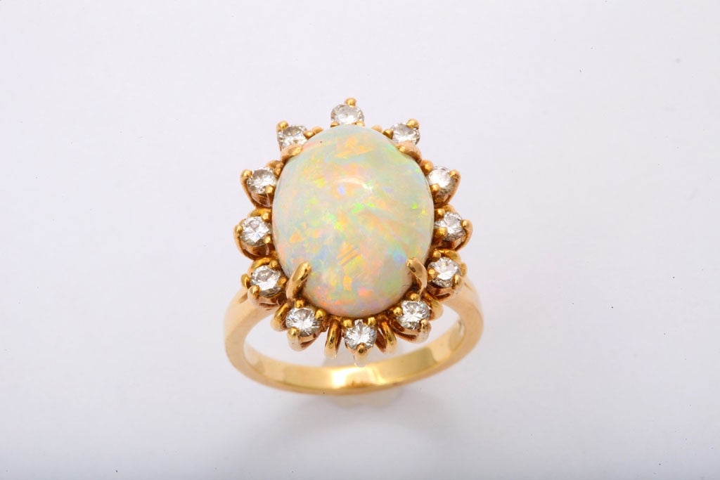 14K Gold, Diamond, and Opal Ring, stamped CDL.  Ring size 5.5
