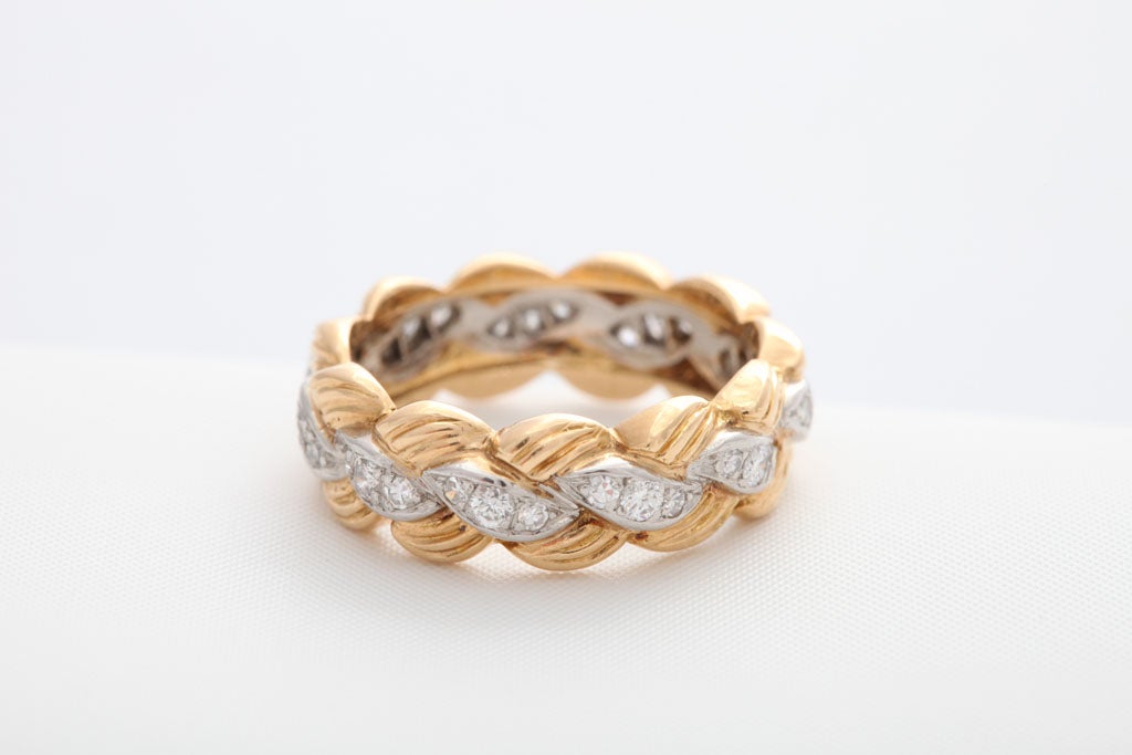 Woven 18k Gold Band with 33 Diamonds set in a Platinum ribbon center.<br />
Signed VCA NY with numbers <br />
Size 5