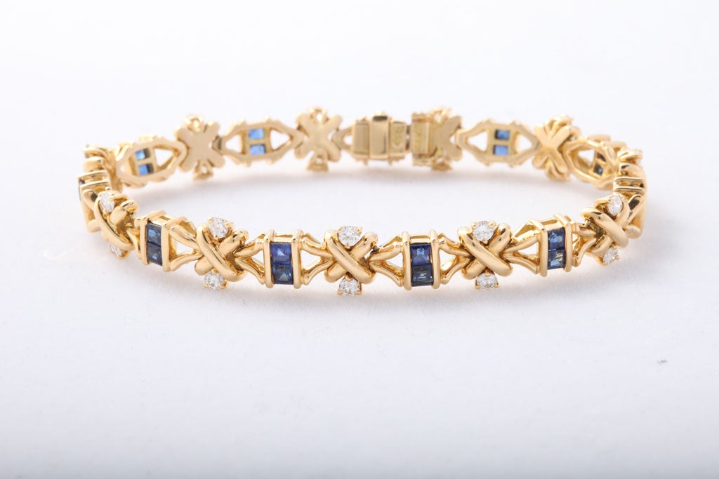 Elegant Diamond, Sapphire & Yellow Gold Strip Bracelet.  Signed HB - Hammerman Bros.  Excellent Quality & full cut diamonds - prong set, alternating with French Cut Channel set Blue Sapphires.