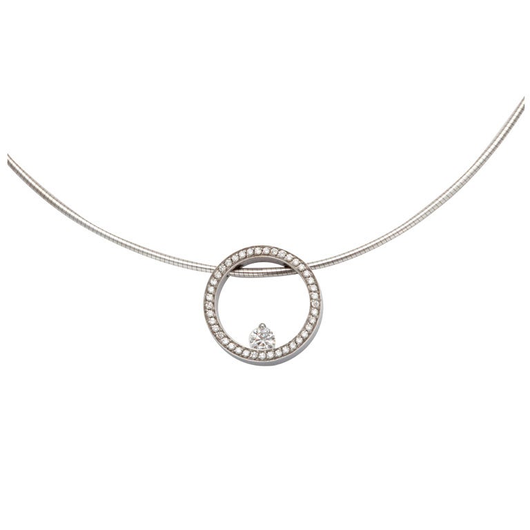 Movado: White Gold and Diamond Pendant