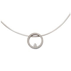 Movado : Pendentif en or blanc et diamant