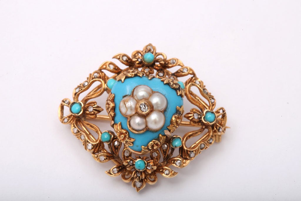 Lovely Victorian Brooch - very ornate  - yet delicate.   Set with Rose Diamonds & half Pearls and Turquoise.  Backed with a central Turquoise Enamel insert