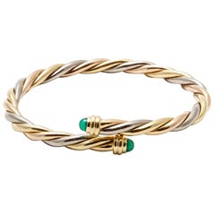 Vintage A tri-colour golden torsade bracelet by Cartier
