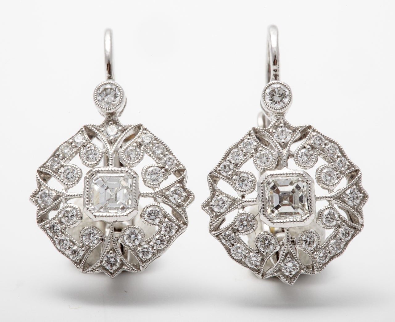 A pair of fiiigree diamond white gold ear pendants For Sale at 1stDibs