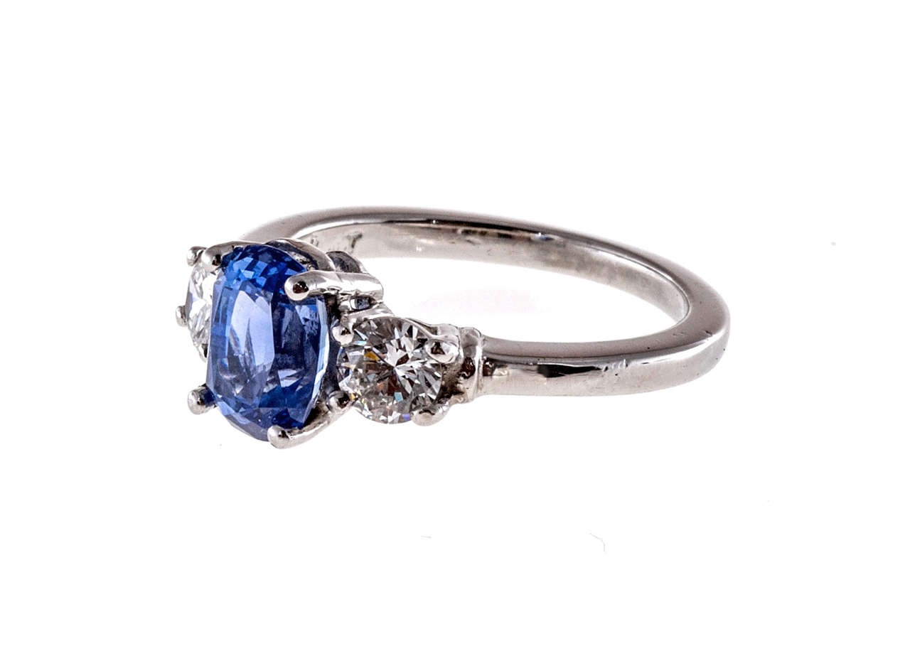 Original handmade Platinum ring circa 1940-1950 with bright fine white diamonds and an extra fine cornflower gem blue all natural cushion Sapphire.

1 cushion cut gem bright blue Sapphire, approx. total weight 1.80cts, VS2, 7.60 x 5.68 x 4.86mm,
