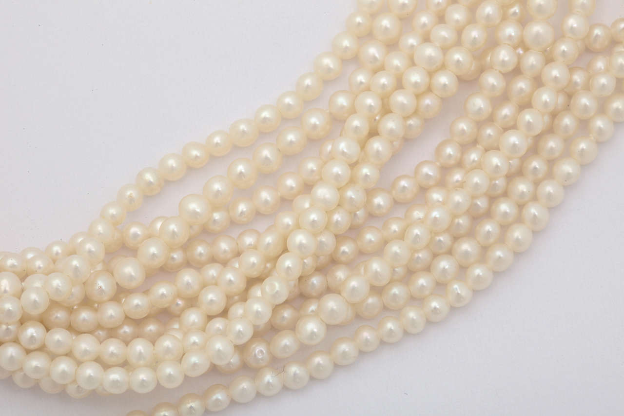 Women's Elegant Multistrand Pearl Gold Floral Clasp Necklace For Sale