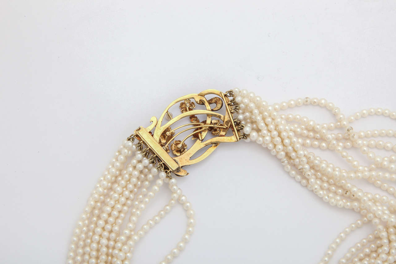 Elegant Multistrand Pearl Gold Floral Clasp Necklace For Sale 2