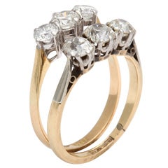 A Pair of Antique Three Stone Diamond Bands 11